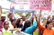 AAP holds protests, demands sacking of 4 BJP ministers